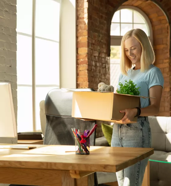 Woman unpacking household items