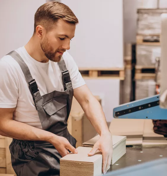 Woman taping a cardboard box